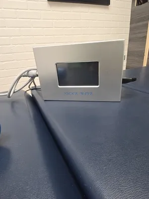 A machine sitting on a blue table.